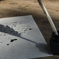 Ink and feather
